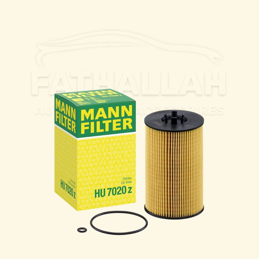 Boîte jaune et verte et cartouche de filtre à huile Mann-Filter HU 7020 z avec ses deux joints d'étanchéité chez Fathallah Auto Maroc.