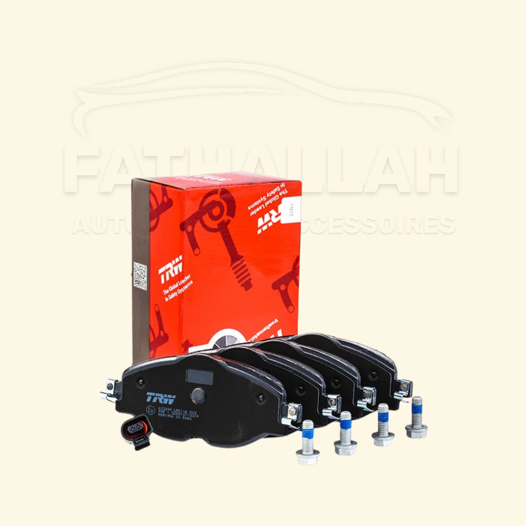 Jeu de plaquettes de frein avant TRW GDB1956 avec leurs vis de fixation et boîte rouge d'origine chez Fathallah Auto Maroc.